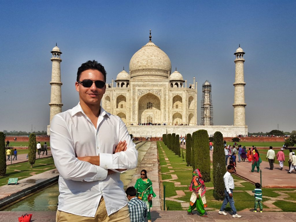 Me standing in front of India's Taj Mahal